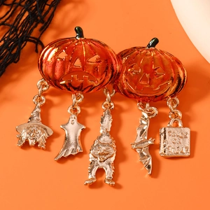 Halloween pumpkin brooch with trick or treat charms in gold alloy and orange enamel