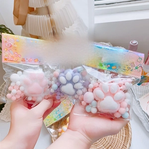 Detailed view of PINCH series cartoon cat paw squishy toys in cute retail packaging