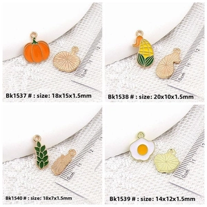 Detailed size comparison of enamel fruit and vegetable alloy charms for DIY crafts