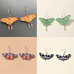 Colorful acrylic butterfly and moth drop earrings set with skull patterns and gold hooks