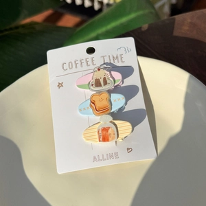 Three-piece hair clip set featuring cute strawberry cake, toast, and bread designs