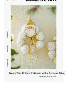 Detail of Christmas wreath pendant with plush balls and golden sequin Santa decoration