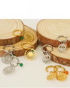 Detail of 18K gold plated stainless steel evil eye earrings with non-fading material