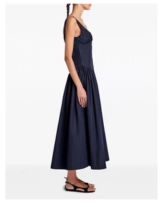 Side view of dark blue maxi dress featuring elegant pleated skirt and sleeveless design