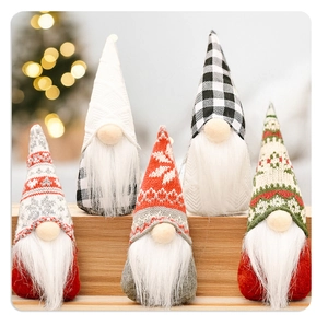 Close-up of five colorful Christmas faceless gnome dolls with knitted hats and faux fur