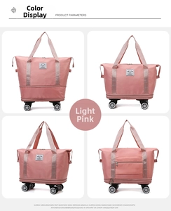 Detail view of pink foldable travel bag with universal wheels and suitcase handle sleeve