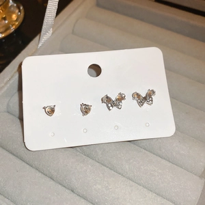 4-piece silver heart and butterfly stud earrings set with sparkling rhinestones