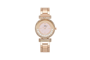Close-up of rose gold fashion watch dial featuring floating crystals and crystal bezel