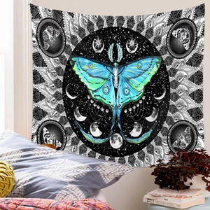 Detail of bedroom wall hanging tapestry featuring mandala butterflies and moon phases art