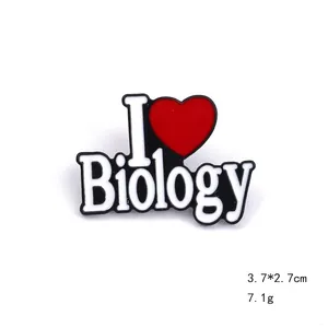 Detail view of I Love Biology enamel pin with dimensions 3.7x2.7cm and weight 7.1g
