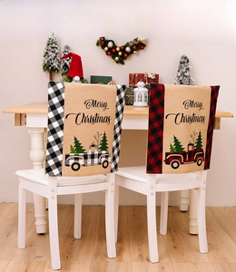 Plaid Christmas chair covers with vintage red truck and Merry Christmas text decor