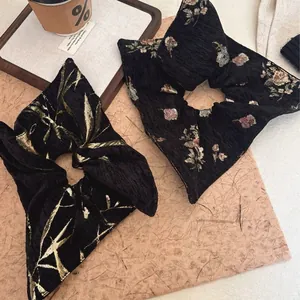 Retro oversized fabric scrunchies with gold leaf jacquard and vintage floral patterns
