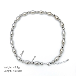 Detail showing 10mm and 8mm olive beads on a 18k gold plated necklace with lobster clasp