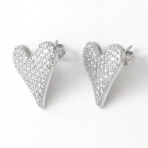 Sparkling heart stud earrings featuring clear pavé cubic zirconia in 18k gold plating
