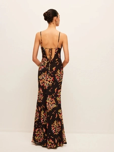 Floral print V-neck maxi dress with an open back and crisscross strap details