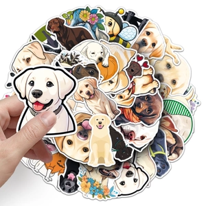 Close-up of cute Labrador dog stickers being peeled, showing various breed colors and styles