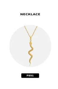 Detail of 18k gold plated snake pendant necklace with intricate scale texture on a chain