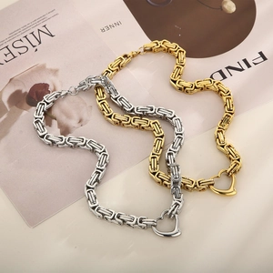 Byzantine chain necklace set in gold and silver finish with heart toggle clasp