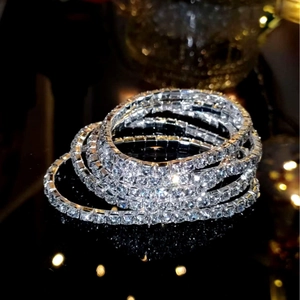 Sparkling silver crystal tennis bracelets stacked in five layers for bridal fashion