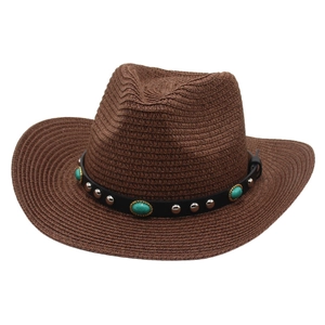 Brown straw western cowboy hat with turquoise and silver studs on black leather band