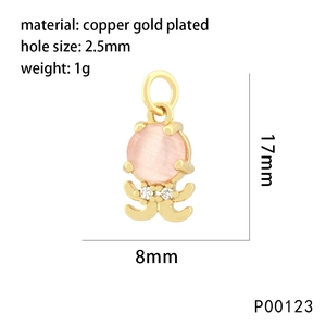 Detailed view of octopus sea creature pendant with pink cat eye stone and cubic zirconia