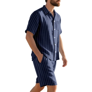 Detail of men's linen short sleeve shirt and shorts set with white vertical stripes