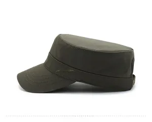Detail of dark olive army cap featuring bird embroidery and metal adjustment buckle