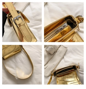 Close-up of metallic gold patent leather shoulder bag with silver zipper and stitching