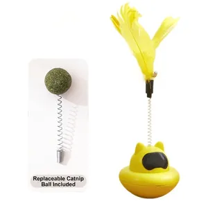 Suction cup tumbler cat toy with yellow feathers and catnip ball for indoor play