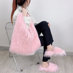 Pink faux fur tote bag and matching fluffy slippers set shown in a stylish lifestyle scene