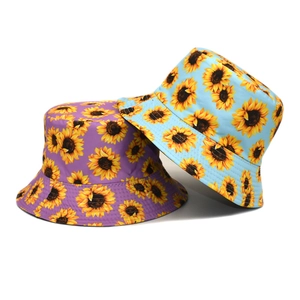 Fashionable sunflower print bucket hats in light blue and purple for sun protection