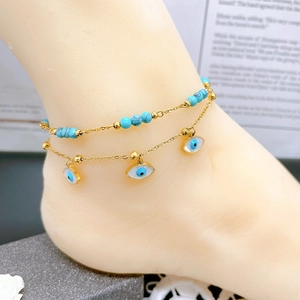 Bohemian double-layer gold anklet with blue turquoise beads and evil eye charms