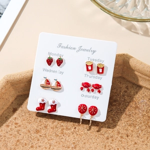 Set of six pairs of colorful stud earrings featuring strawberry, fries, and crab designs