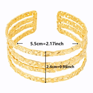 Detail view of 18k gold plated stainless steel hammered texture open cuff bracelet