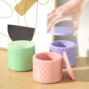 Detailed relief texture on colorful silicone molds for storage jars and candle cups