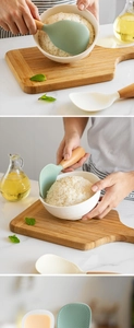Close-up of heat-resistant silicone rice paddles with wooden handles and textured heads