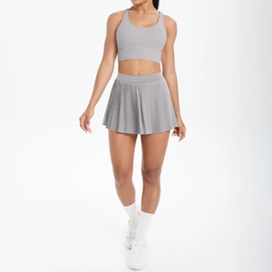 Détails de la texture de la jupe plissée élastique et de la taille de l'ensemble de yoga