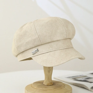 Chic beige faux suede newsboy cap for women featuring a stylish silver metal buckle
