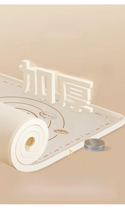 Detail of 6mm thick food-grade silicone kneading mat with precise measurement scales