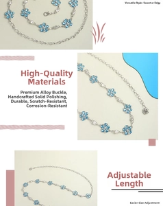 Detail of silver chain belt with blue flower charms, rhinestone centers, and rose drop