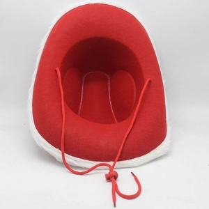 Top view of red Christmas cowboy hat with white faux fur trim and adjustable drawstring