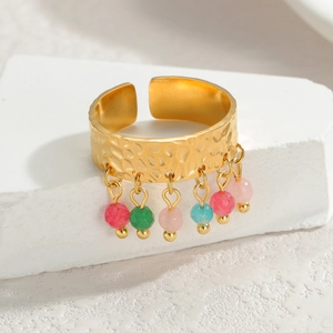 French vintage hammered gold open ring with colorful stones on white stone display