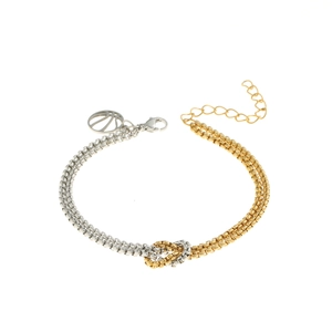 Two-tone gold and silver stainless steel layered knot bracelet with geometric tag