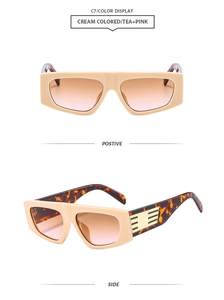 Detail view of cream sunglasses with tea pink gradient lenses and tortoiseshell temples