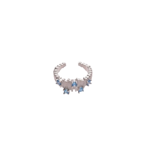 Irregular geometric open ring with blue zircon stones and brushed silver texture