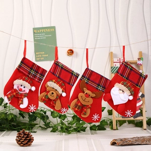 Set of 4 Christmas stockings with 3D Santa, snowman, bear, and reindeer hanging decorations