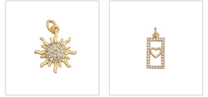 Detail of gold-plated sun and heart pendants with cubic zirconia for DIY jewelry