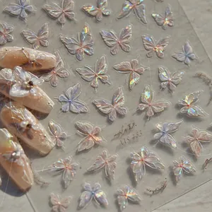 Macro shot of iridescent aurora butterfly nail art stickers with laser pearlescent finish