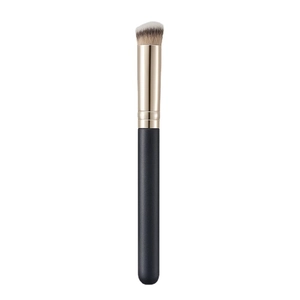 Professional angled concealer brush with golden ferrule and beige gradient bristles
