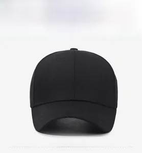 Front view of a minimalist black cotton twill baseball cap with curved brim and ventilation